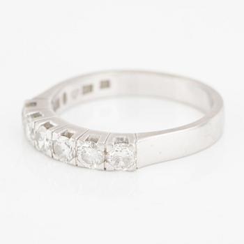 Ring, halvallians, 18K vitguld med briljantslipade diamanter totalt 0.75 ct enligt gravyr.