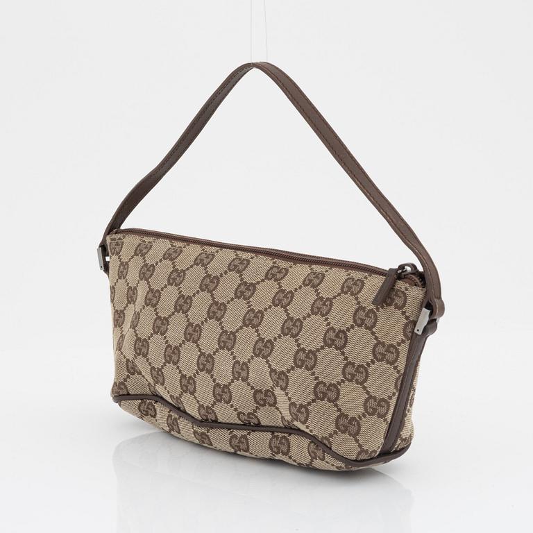 Gucci, a monogram canvas bag.