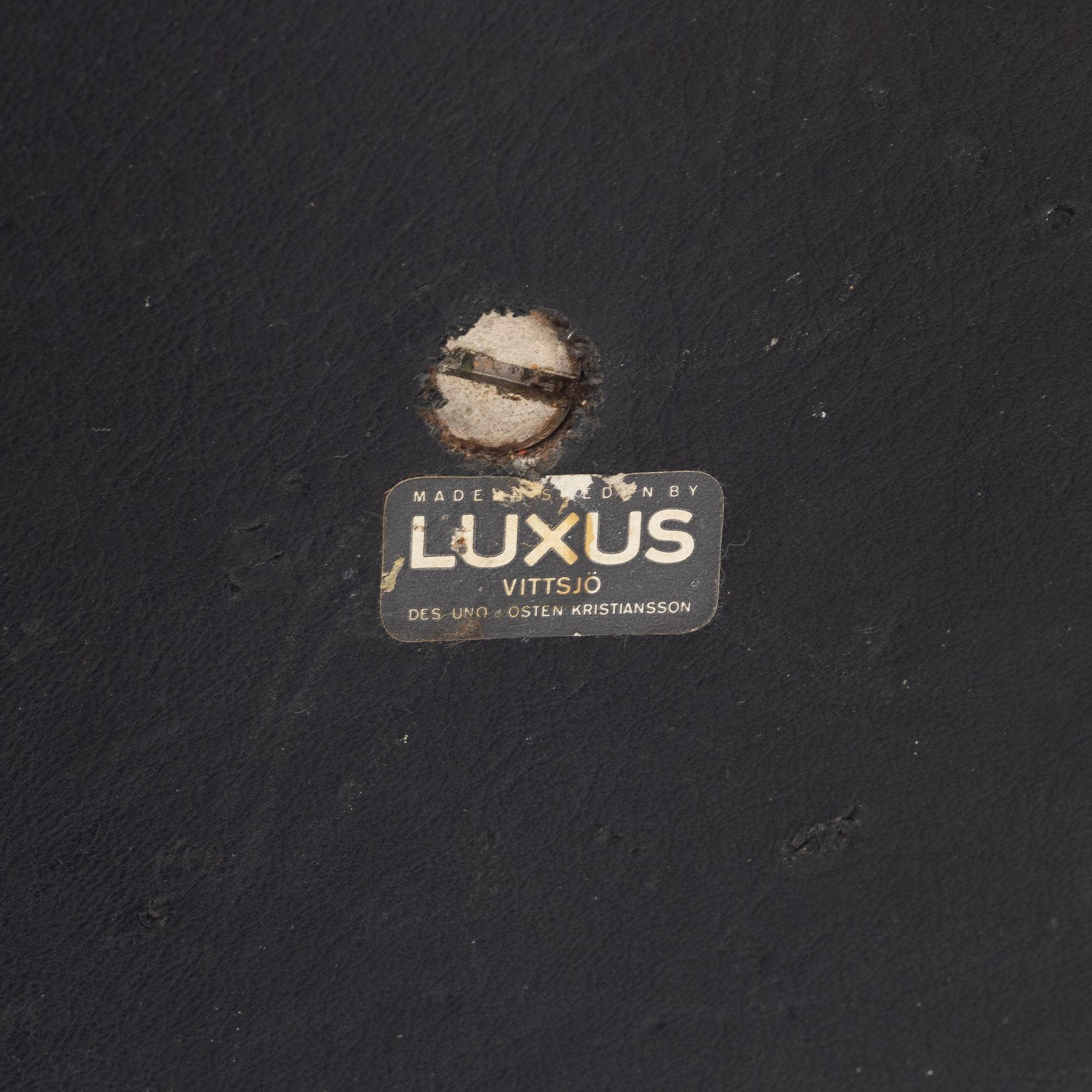 Uno & Östen Kristiansson, a matched pair of red floor lights, Luxus, Vittsjö.