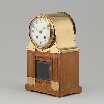 A jugend table clock from early 20 th century.