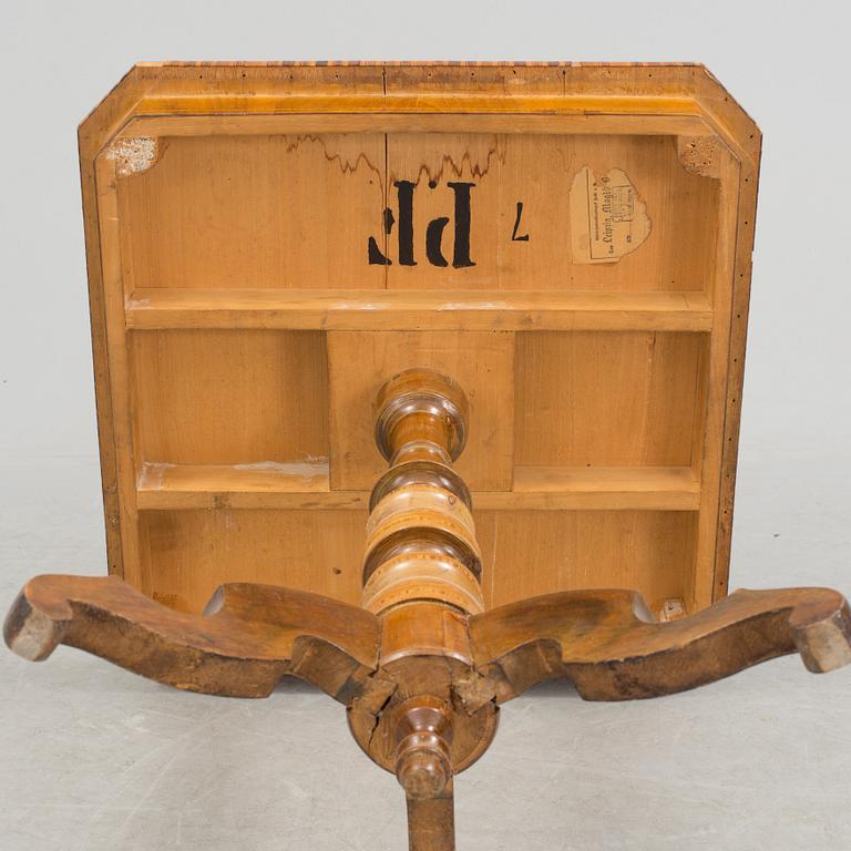 A intarsia table from the late 19th century.