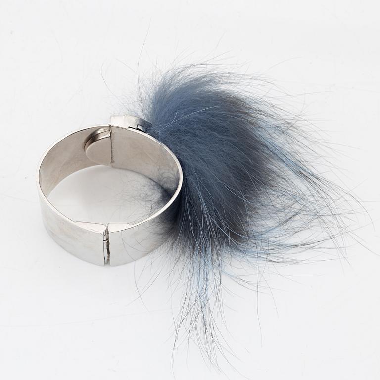 Fendi, a silvertone metal, rhinestone and fur bracelet.