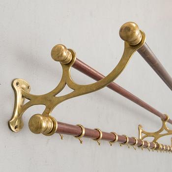 An early 20th century clothes rack.