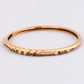 A BRACELET, 14K gold, small diamonds and sapphires. Soviet.