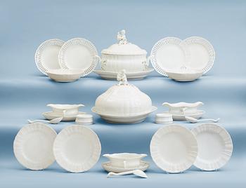 663. A Berlin dinner service, 19th Century. (73 pieces).