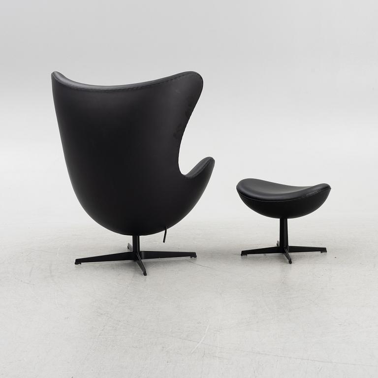 Arne Jacobsen, an "Egg" lounge chair with ottoman, Fritz Hansen, Denmark, 2022.