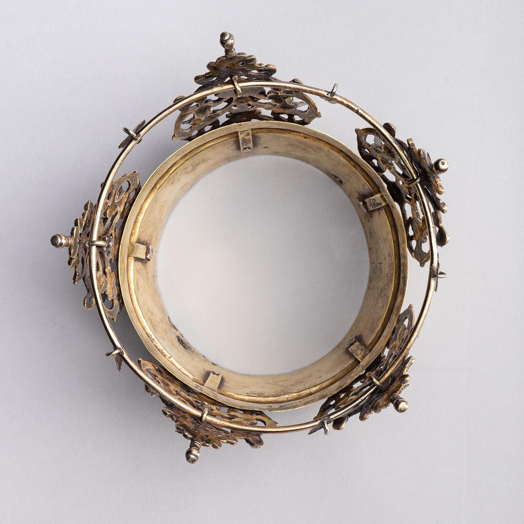 A Swedish early 19th century parcel-gilt silver bridal crown, mark of Erik Ramstedt, Härnösand 1801 and copper case.