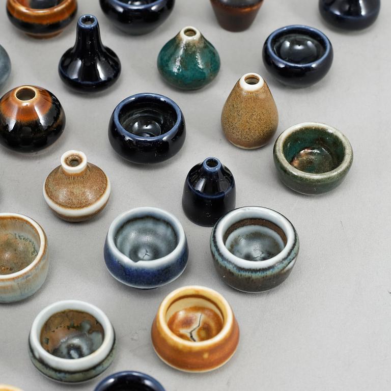 RÖRSTRAND, a set of 52 stoneware mini miniature vases and bowls.