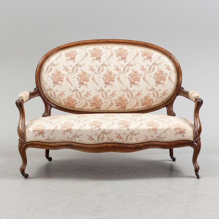 A sofa, two armchairs and two chairs, rococo style, first half of the 20th century.