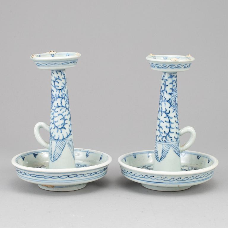 A pair of blue and white candle holders, Qing dynasty, late 19th century.