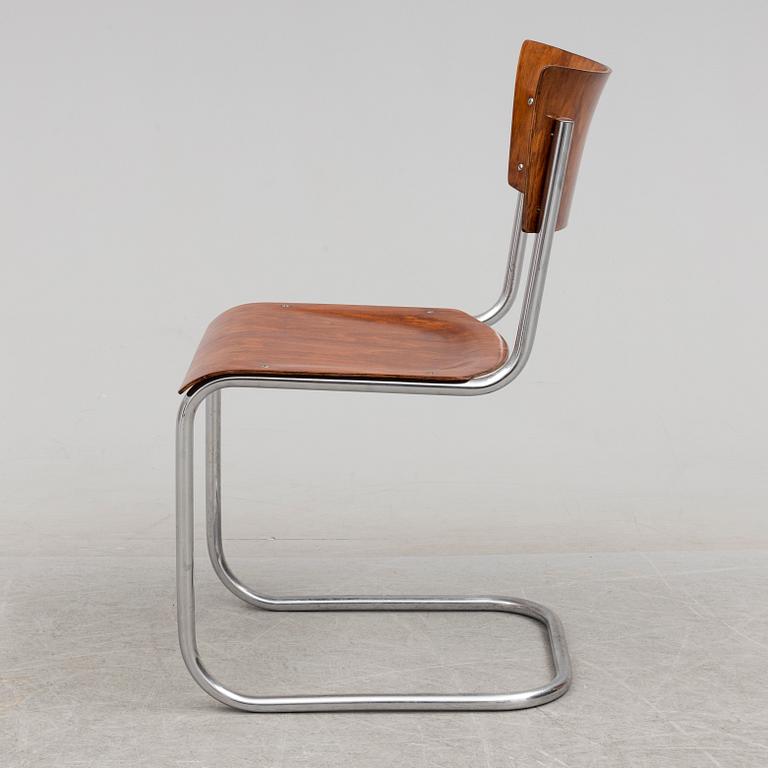 A 1930s writing desk by Jindrich Halabala and chair by Mart Stam.