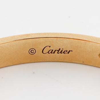 CARTIER, Love bracelet with four brilliant cut diamonds ca 0.40 ct in total.