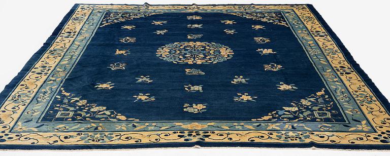 An antique Peking (Beijing) carpet, North China, c. 340 x 275 cm.