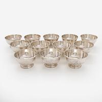 A set of 12 silver dessert bowls, Bryan Savage England 1979.
