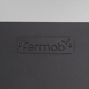 A 'Luxembourg' lounge chair and a foot stool, Fermob.