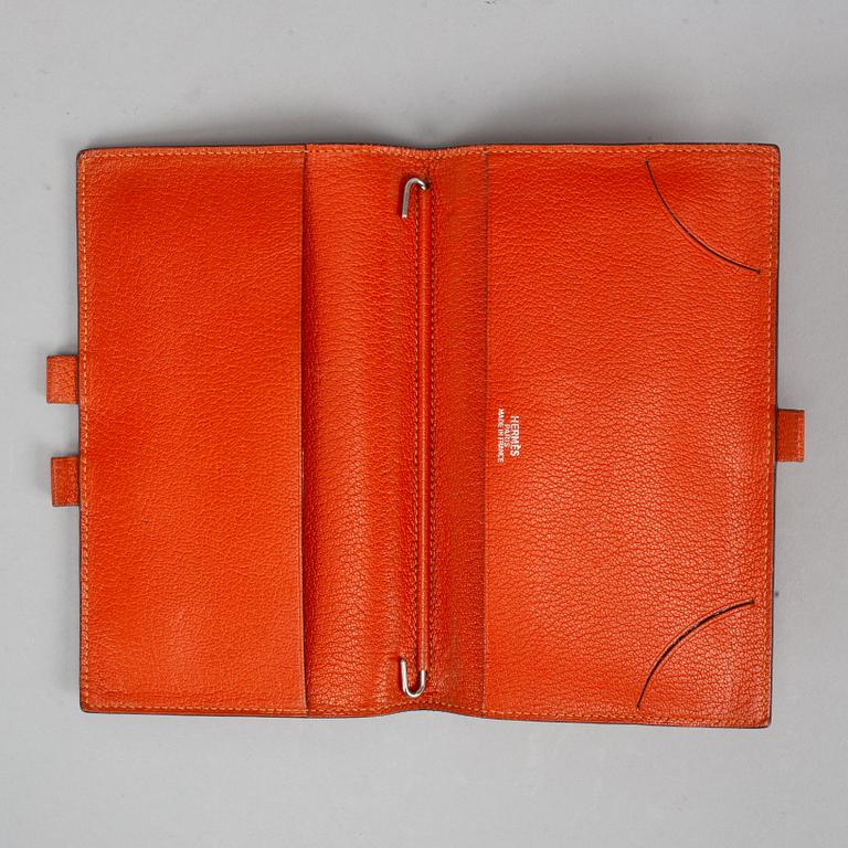 Hermès, scarf and leather cover.