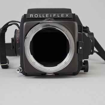 A Rolleiflex SL 66 E camera no 902510006 with three lenses.