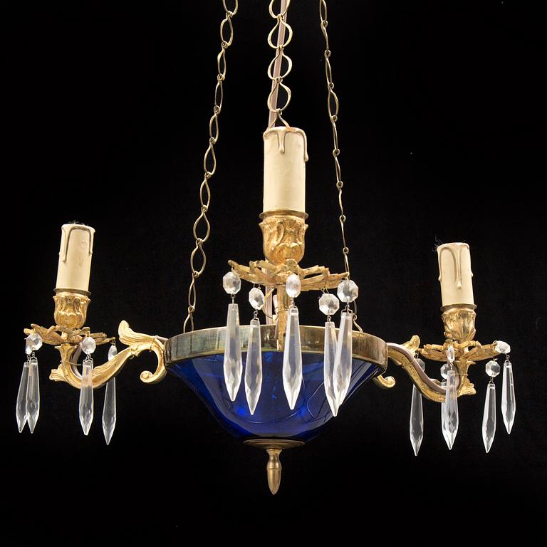 A MID 19TH CENTURY LAMP.