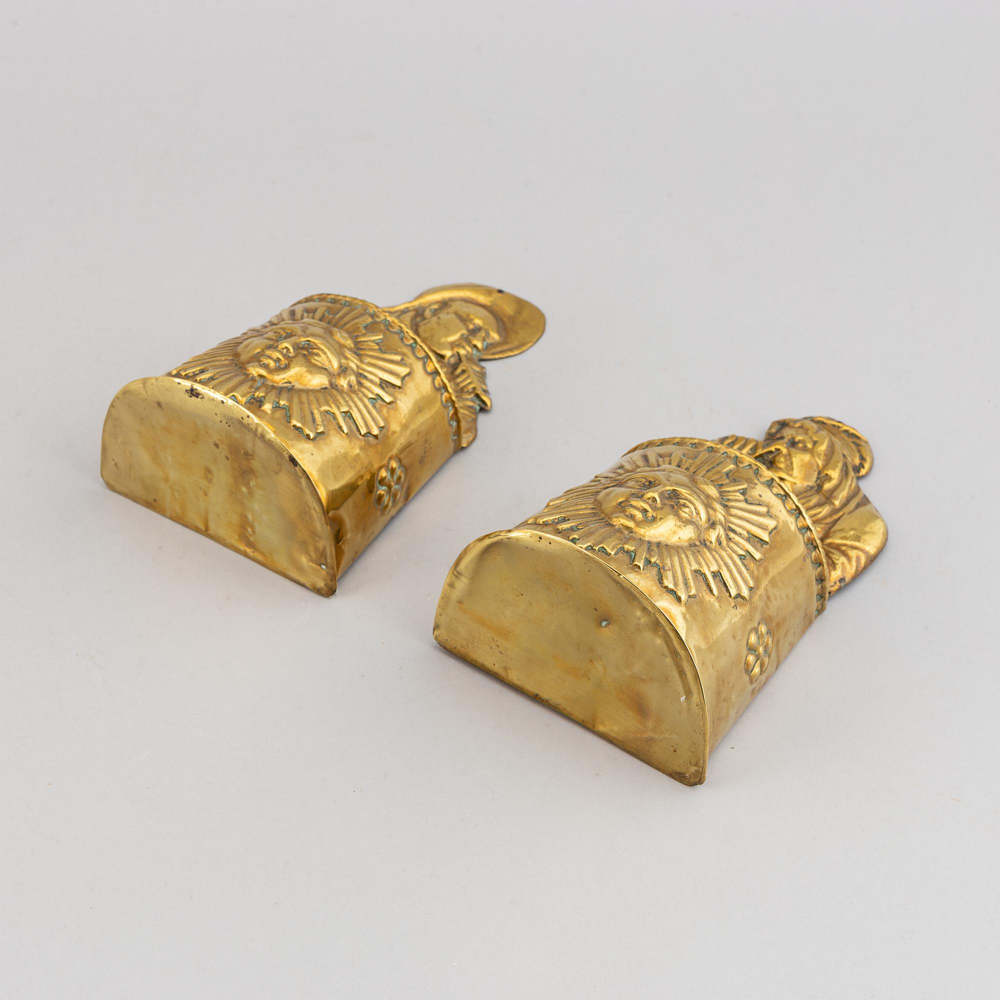 A pair of 19th century brass cutlery holders.