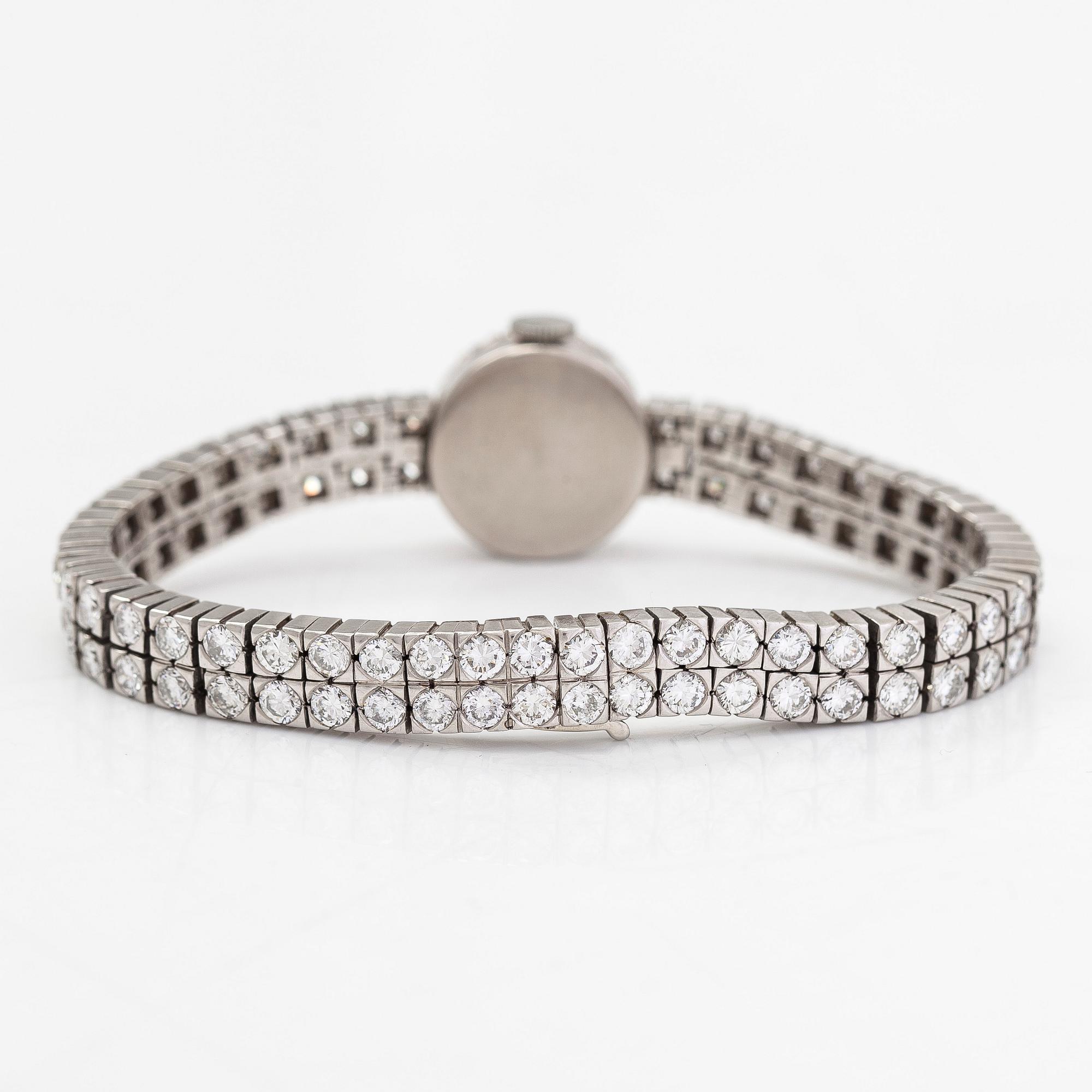 Armbandsur, platina/18K vitguld, med briljant- och 16/16 slipade diamanter tot ca. 7.10 ct.