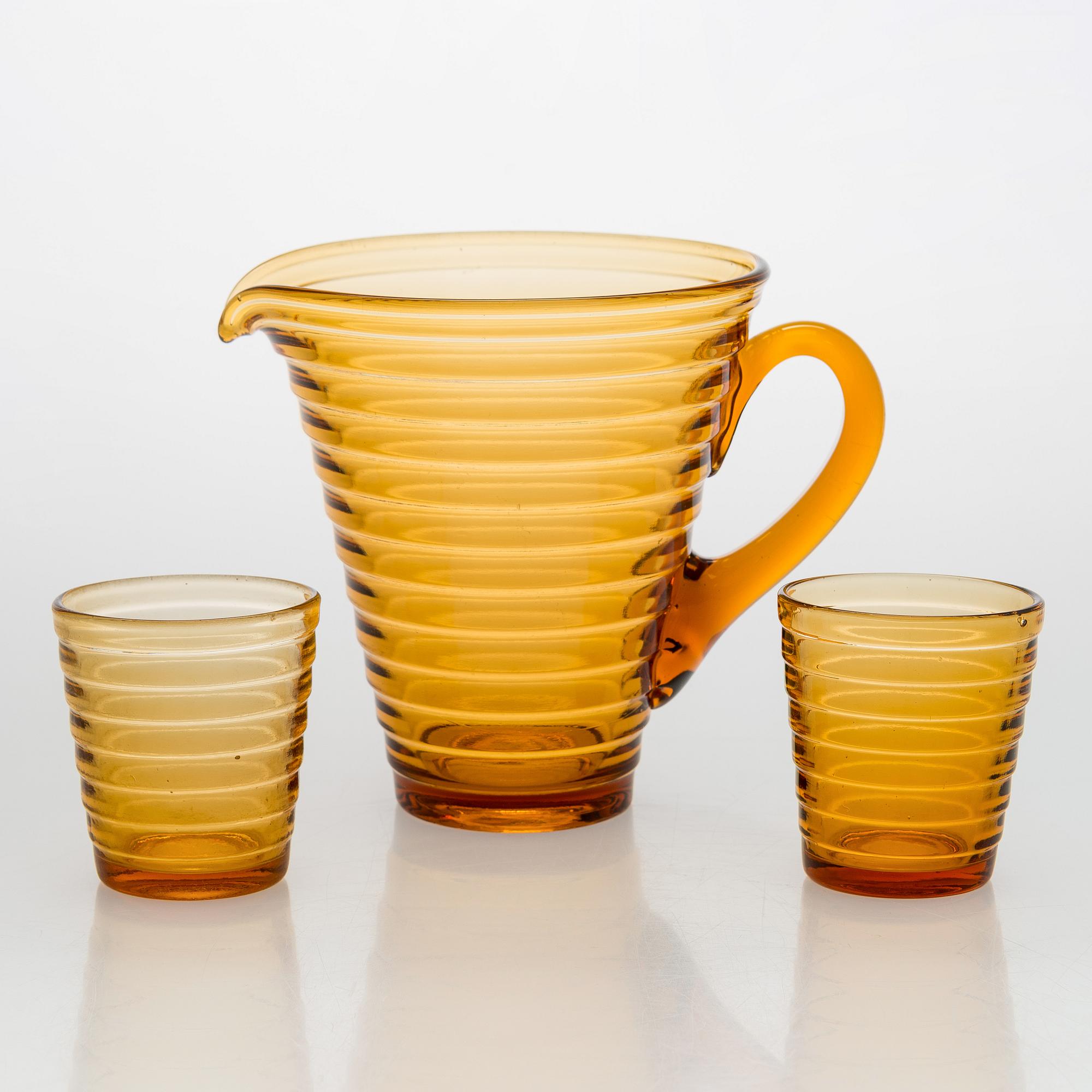 Aino Aalto, A 1930s pitcher model 4644 and two drinking glasses model 4056 for Karhula for Karhula Glassworks, Finland.