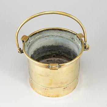 An 18th century brass brazier.