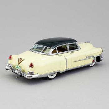 A tinplate Marusan Cadillac, Japan, ca 1951.