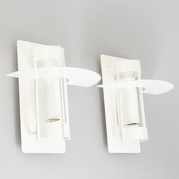 A set of two wall lamps by Joachim Lepper for Louis Poulsen, Danmark.