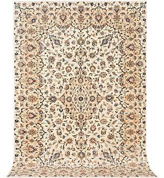 A Kashan carpet, a. 305 x 195 cm.