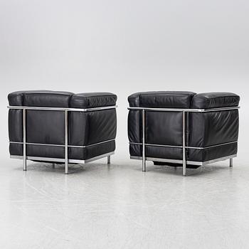 Le Corbusier (Charles-Édouard Jeanneret), Pierre Jeanneret, Charlotte Perriand & Le Corbusier, a pair of 'LC2' armchairs, Cassina.