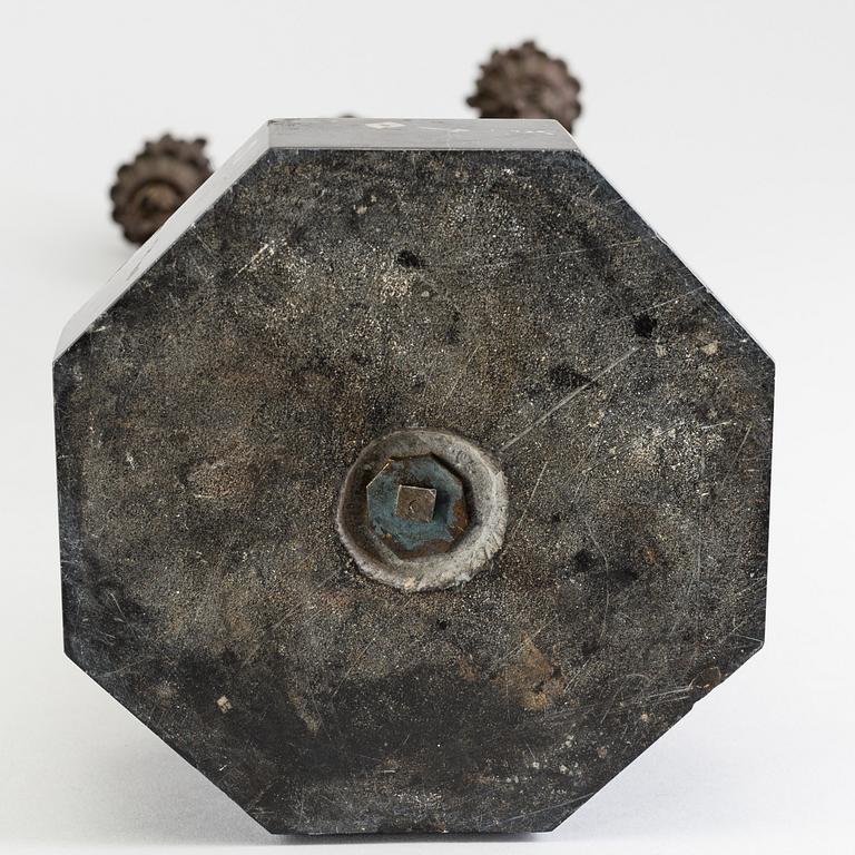 A pair of late 19th century patinated brass candelabra.