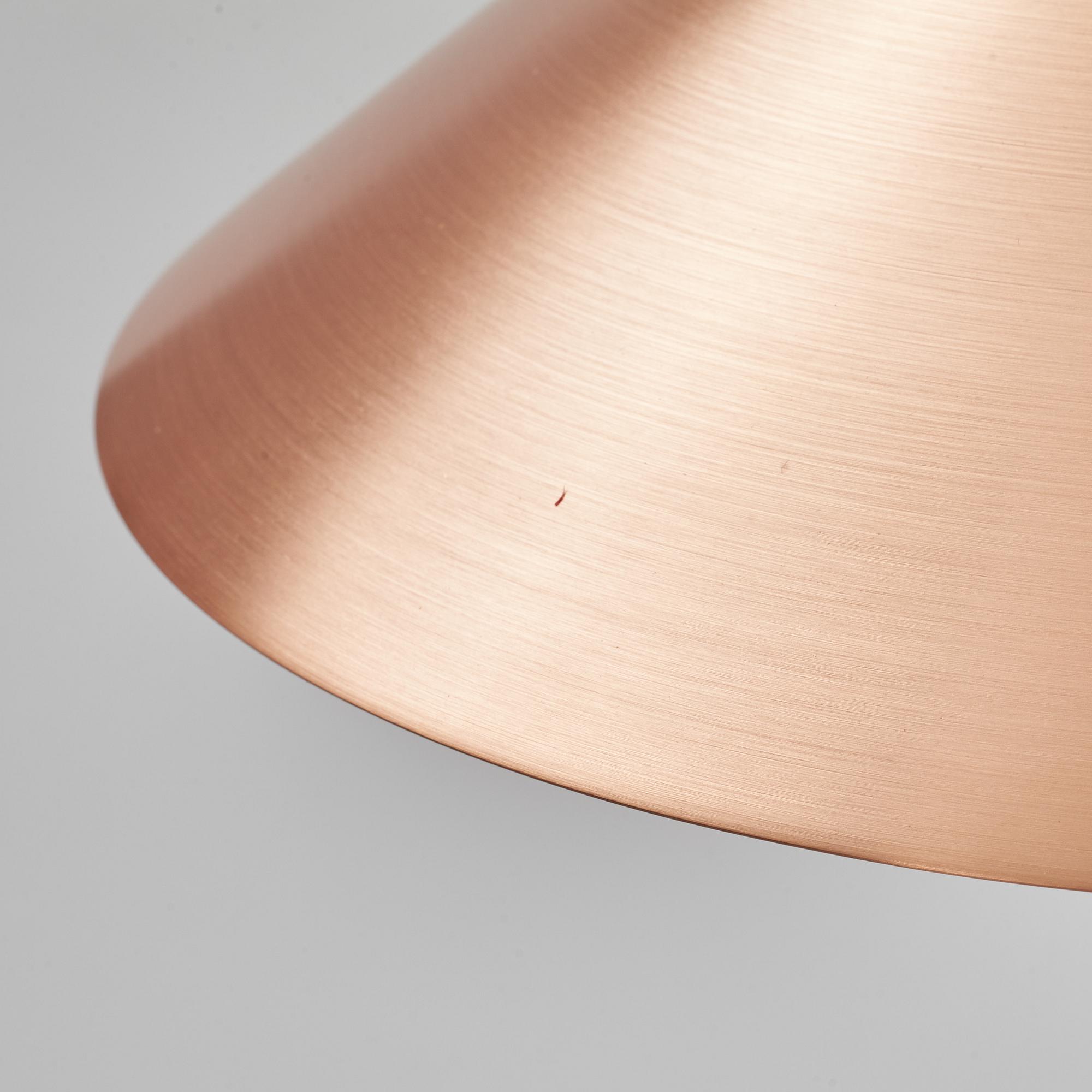 A pair of Frama Shade 360 ceiling lamps.