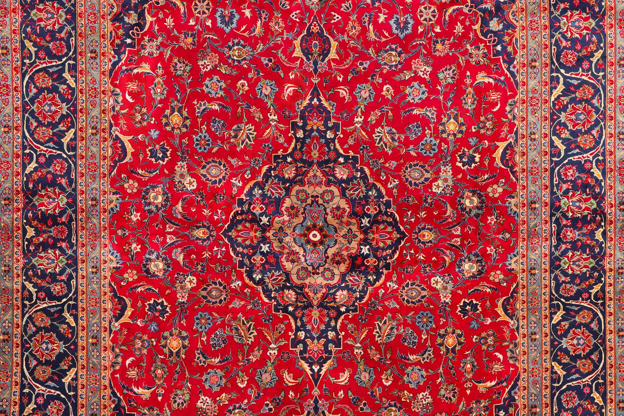 A Keshan carpet, c. 408 x 295 cm.