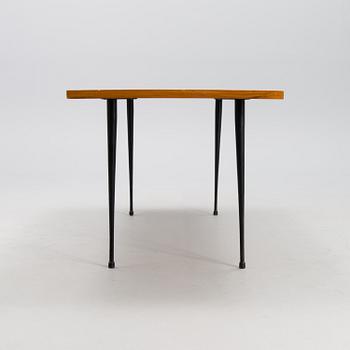 A coffee table marked Tapio Wirkkala, Asko, Made in Finland.