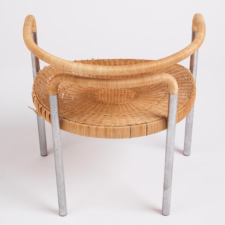 Poul Kjaerholm, a steel and rattan 'PK12' chair, E Kold Christensen, Denmark, early 1960s.