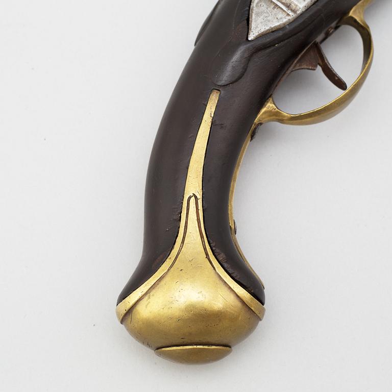 A 18th century flintlock pistol.