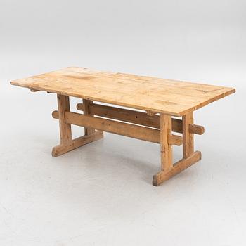 A 19th Century pinewood trestle table, 19th Century.