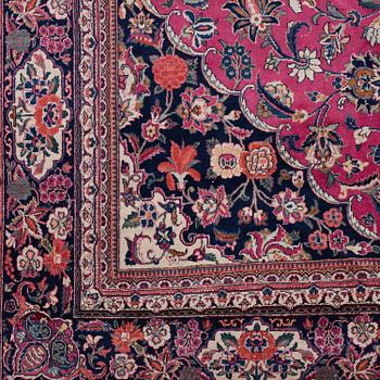 A CARPET, semi-antique Kashan, around 344 x 230 cm.