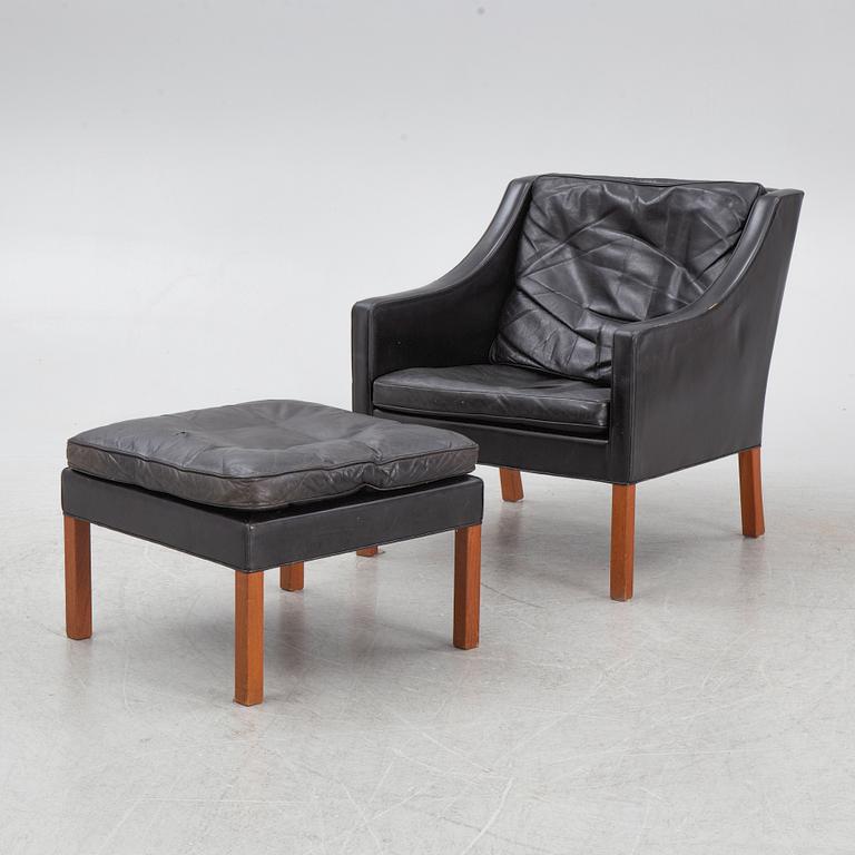 Børge Mogensen, a model 2207 armchair with ottoman, Fredericia Stolefabrik, Denmark, second half of the 20th century.