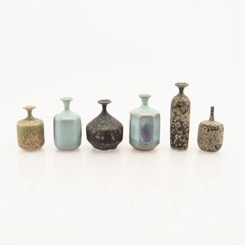 Rolf Palm, a set of six signed miniature vase stoneware.