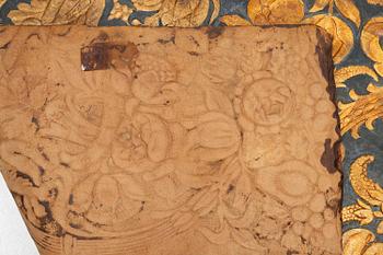 A 19th century wrought leather wallpaper, ca 388 x 97 cm.