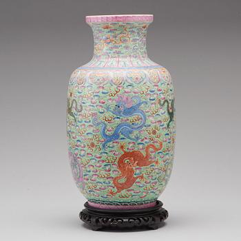 A famille rose and green ground vase, Republic (1912-49), with Qianlong six character mark.