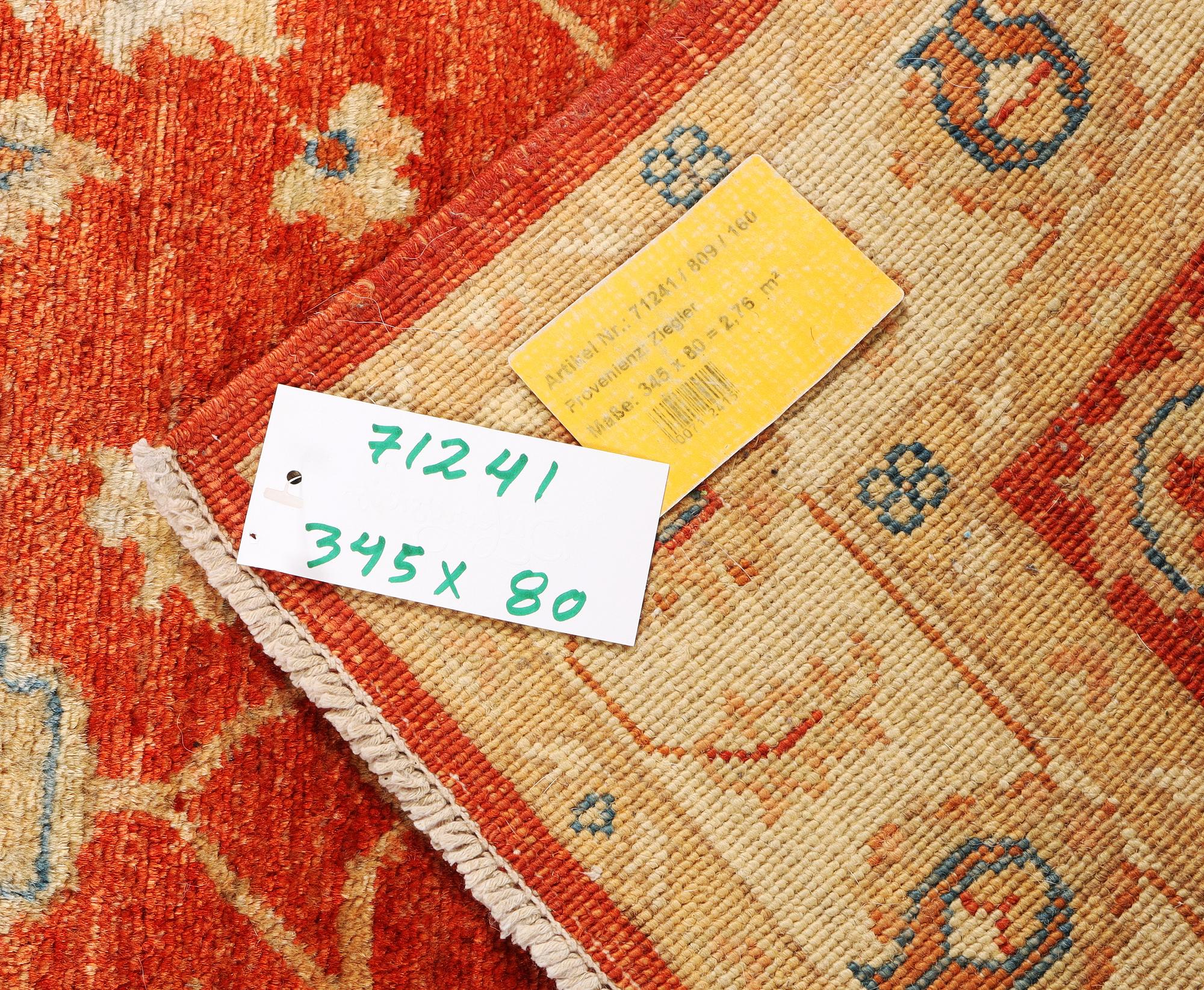 A Ziglar Design runner, c. 345 x 80 cm.