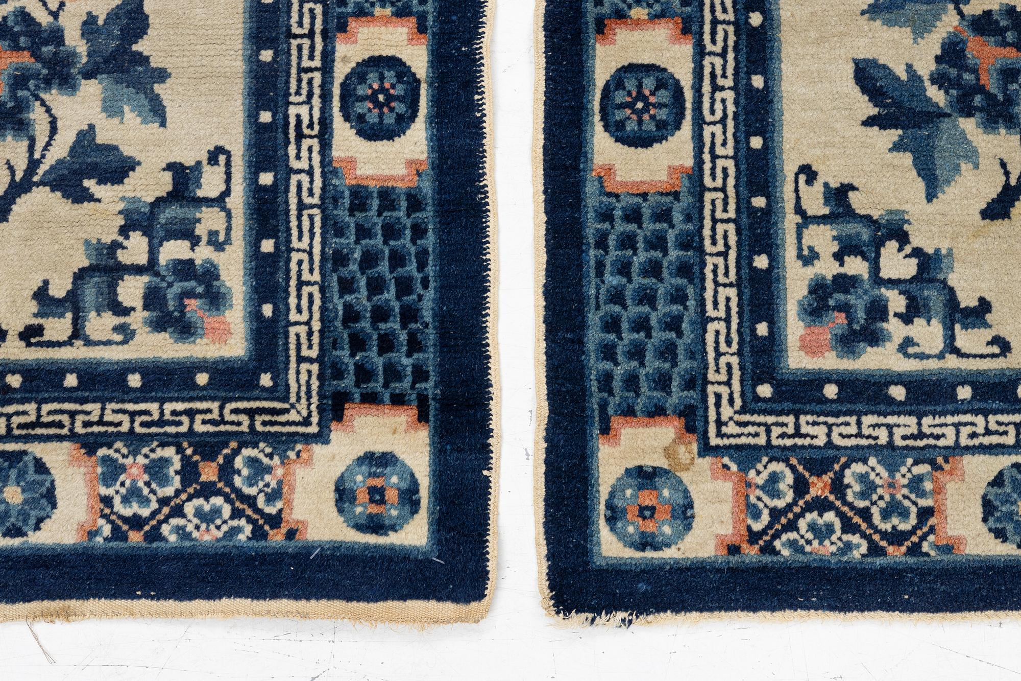 A pair of Baotou rugs, China, c. 120 x 64 cm.