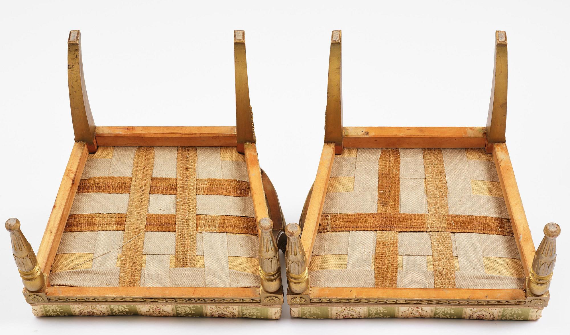 A pair of late Gustavian open armchairs attributed to E. Ståhl (master in Stockholm 1794-1820).