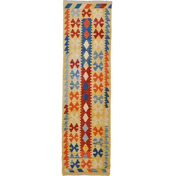 A kilim runner, 285 x 81 cm.