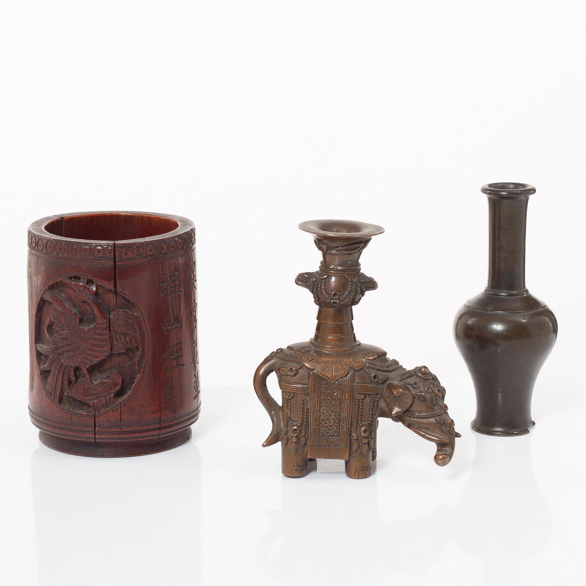 A Chinese bronze vase, joss stick holder and a bamboo brush pot, Qing dynasty.
