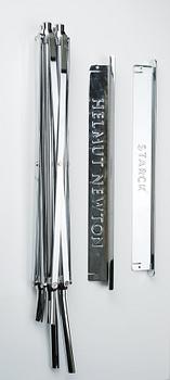 Helmut Newton, Signed book published by Taschen, Monte Carlo, 1999, ed 10000, with a metal table.