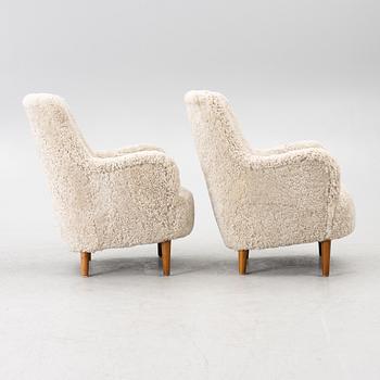 Carl Malmsten, A pair of Samsas easy chairs, second half of the 20th century.