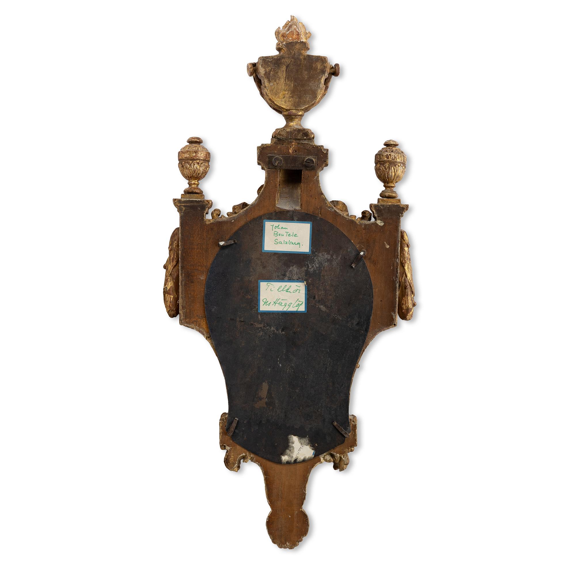 An Austrian Louis XVI giltwood cartel clock by J. Bentele (watchmaker in Salzburg ca 1780).